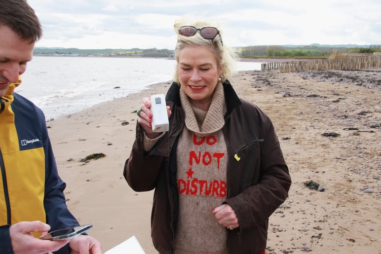 West Somerset MP Rachel Gilmour displays a water test result on Dunster Beach which took just 15 minutes. PHOTO: George Ody.