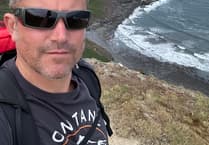 Minehead lifeboat crewman Rob Hickley nears end of coast path charity walk