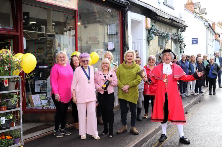 Maria Morgan (centre) with Watchet's mayor, Cllr Loretta Whetlor, local MP Rachel Gilmour and town crier David Milton at the opening of "Maria's Casual Wear" on Easter Monday 