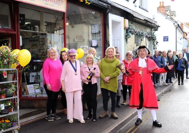 Maria Morgan (centre) with Watchet's mayor, Cllr Loretta Whetlor, local MP Rachel Gilmour and town crier David Milton at the opening of "Maria's Casual Wear" on Easter Monday