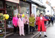 Town dogged by setbacks starting to recover as it welcomes new shop