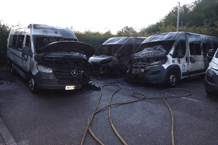 Some of the disabled access minibuses destroyed in Saturday's arson attack on Taunton's Silk Mills park and ride site. PHOTO: ASP.