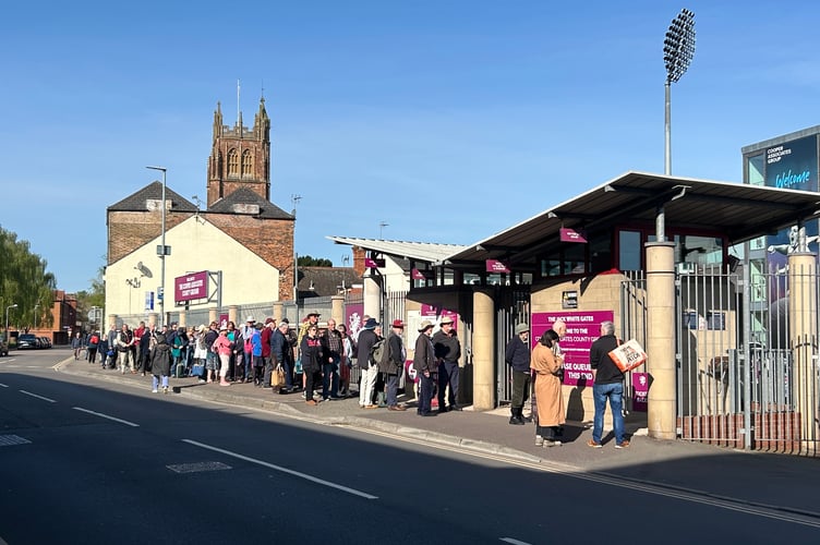 Supporters queue in St James Street for Somerset Women's first ever match at Taunton