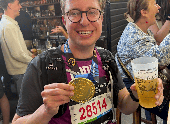 Minehead's Edward Cleere relaxes after running the London Marathon for the National Deaf Children’s Society.