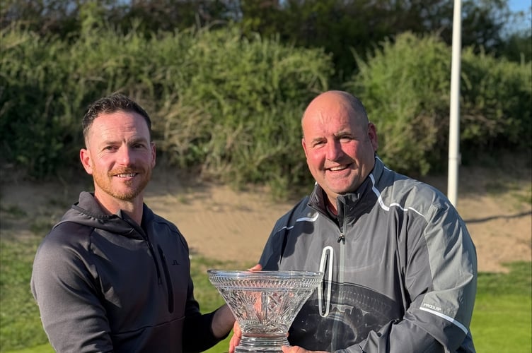 Jonathan Grace (left), winner of the Bickerton Bowl, receives the award from John Bickerton.