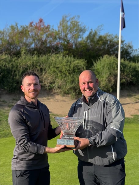 Jonathan Grace (left), winner of the Bickerton Bowl, receives the award from John Bickerton.