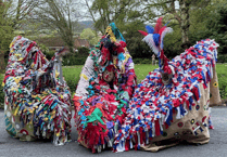 Street performance by Minehead's three hobby horses for end of season 'bootie night'