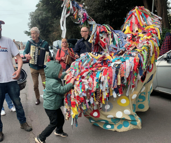 Minehead's Traditional Sailors Hobby Horse performing last year.