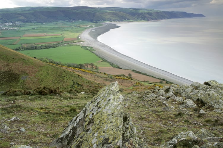 Bossington Beach on the Holnicote Estate viewed from Hurlstone Point. This rocky outcrop is in stark contrast to the flat shingle bank where the managed retreat is to be formed.