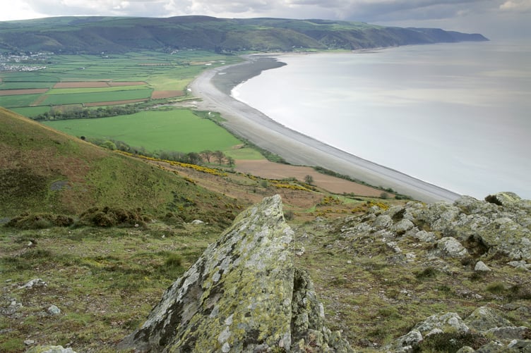 Bossington Beach on the Holnicote Estate viewed from Hurlstone Point. This rocky outcrop is in stark contrast to the flat shingle bank where the managed retreat is to be formed.
