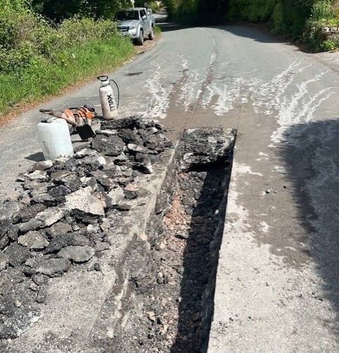 Highways contractors had to excavate an Exmoor road when a sink hole started to appear. PHOTO: Travel Somerset.