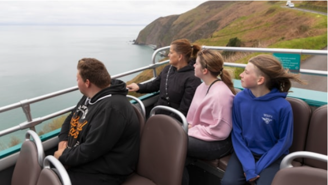 Passengers enjoy an open top bus journey along the Exmoor coast. PHOTO: First Bus.