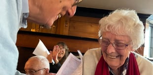 Community singing captures VE Day spirit