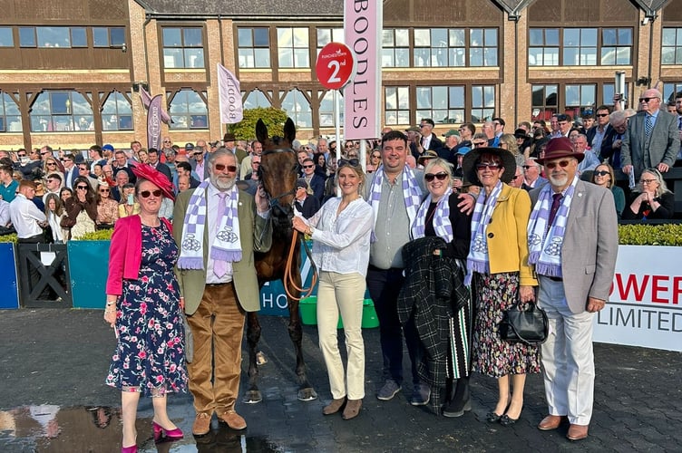Golden Ace with connections after finishing second at Punchestown