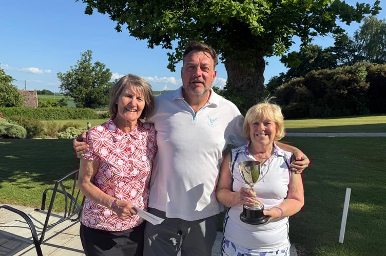 Lady Captain Lorraine Taylor presents Lamb Cup to Ed Ingram and Christine Hannam 