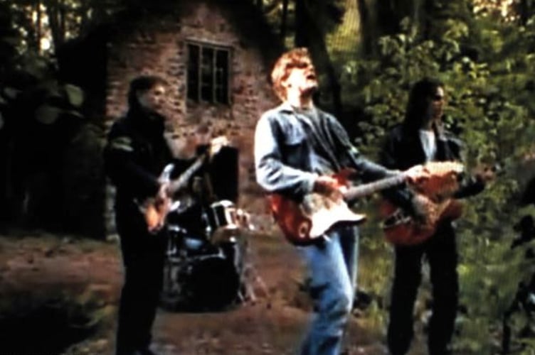 Singer Bryan Adams performs in front of ruined Silk Mills, Holford.