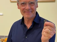 Brass button lost for a century is reunited with owner's family