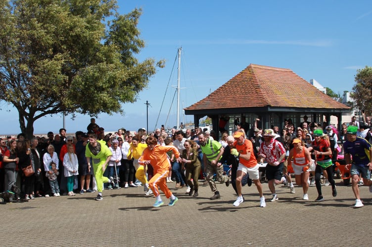 It was a running start before teams took to their finely tuned racing machines for the annual Watchet Wheelbarrow race. PHOTO: George Ody.