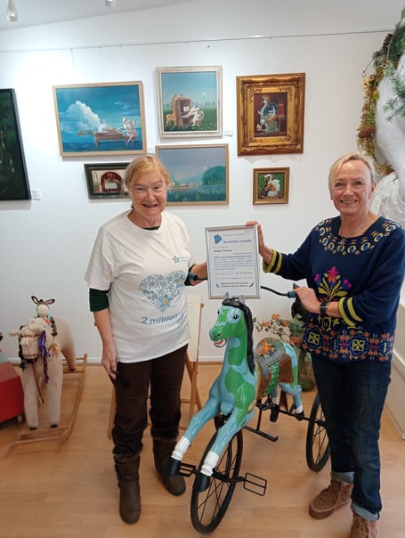 Margaret Tatham  and Jill Newton in No 13 Anchor Street Watchet with one ofJill’s collection of rocking horses