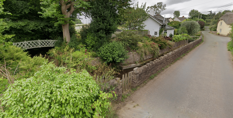 The River Hanny runs alongside a road in Wootton Courtenay. PHOTO: Google Maps.