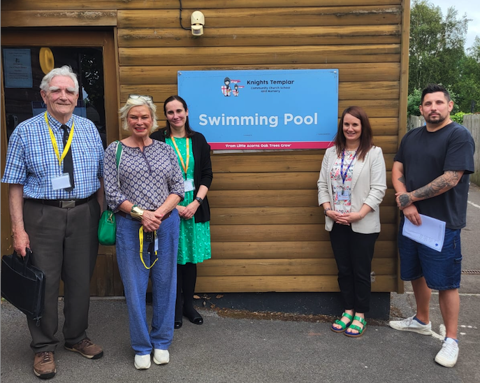 Celebrating Knights Templar School's swimming pool repair fund-raising success are (left to right) pool committee leader Jim Butterworth, MP Rachel Gilmour, school governors vice-chairman Jennifer Thomas, headteacher Laura Weaver, and town Cllr Sean Terrett.