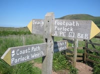 Coast path boardwalk to cross salt marshes