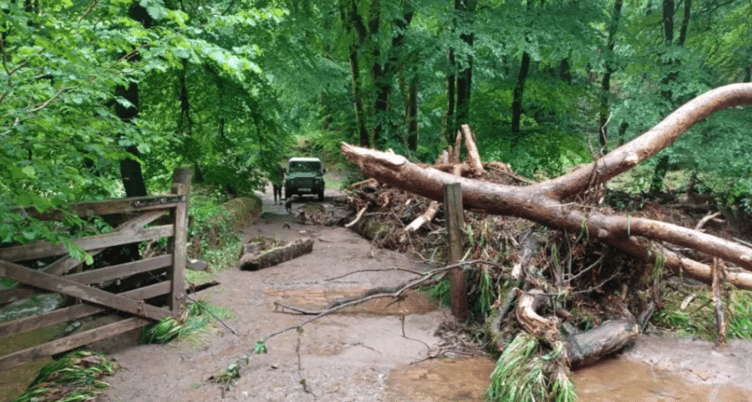 Weekend storms saw a small Exmoor river rise by more than six feet in less than two hours and sweep away a bridge and trees. PHOTO: ENPA.