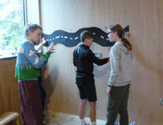 Minehead Middle School pupils arranging their art exhibition in a gallery at East Quay, Watchet. PHOTO: MMS.