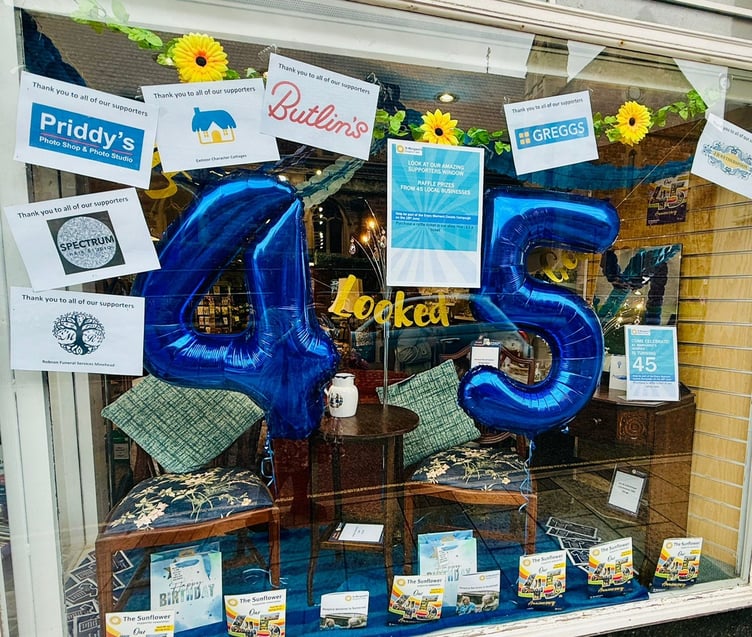 The shop window of St Margaret's Hospice furniture store in Friday Street, Minehead.