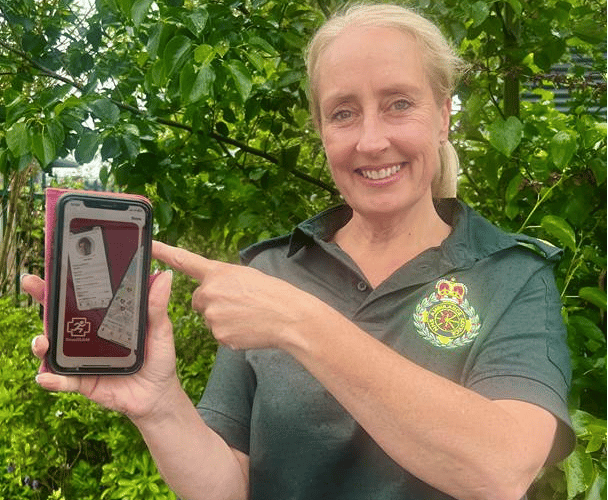 Ambulance service community engagement and training officer Domonique Hobbs with the 'GoodSAM' app.