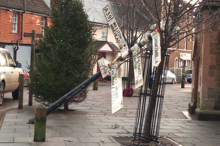 How the Nether Stowey fingerpost was left after being hit by a vehicle on Christmas Eve. PHOTO: Nether Stowey Parish Council.