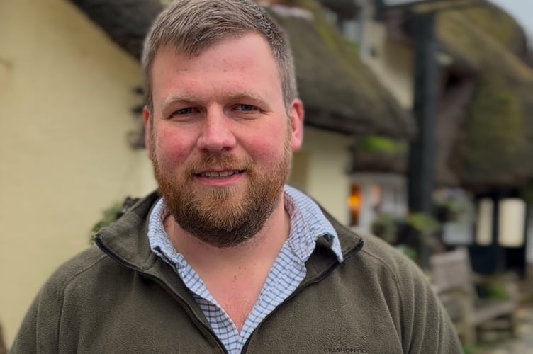 Exmoor farmer and campaigner James Wright has criticised the cost of a short stretch of A39 cycle path.