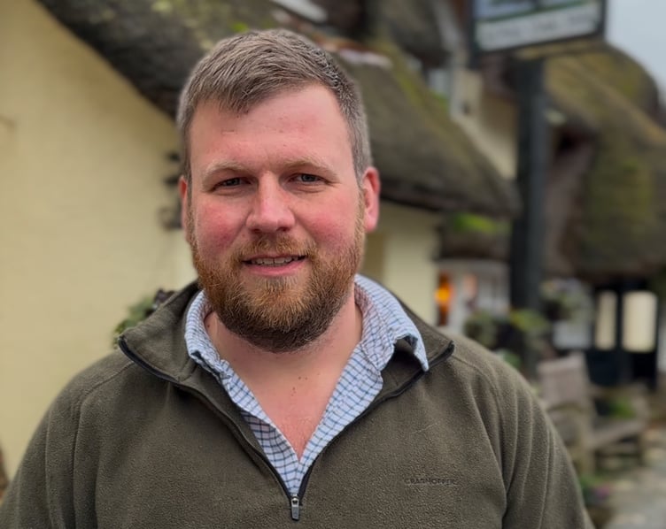 Exmoor farmer and campaigner James Wright has criticised the cost of a short stretch of A39 cycle path.