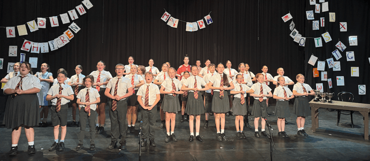 Minehead Middle School pupils on the stage of the Regal Theatre performing Matilda Jr. PHOTO: MMS.
