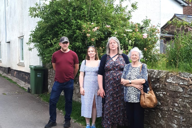 Outside School House great grand children James and Milly Jackson, Andrea Jackson and Pat Harrower