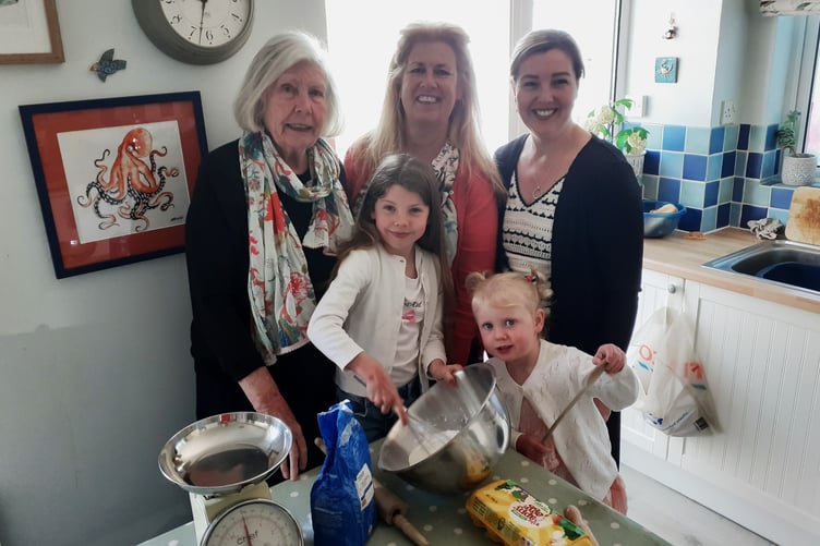Getting some practice in for the fete scones, Isla, seven, and Layla, three, with left to right, their great-grandmother Anne Comins, grandmother Jo Lamont and mum Carley Lamont
