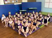 Eighty young gymnasts in inter-club competition 