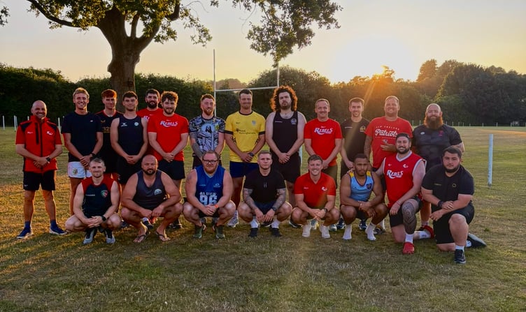 Rebels Rugby players line up before training