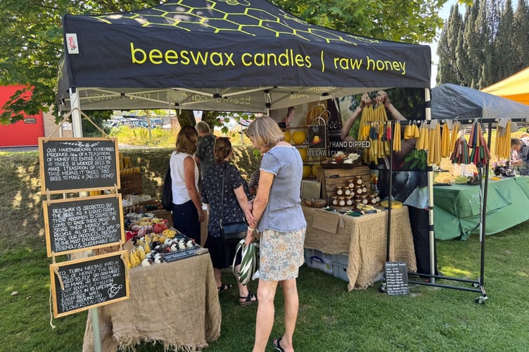 A beeswax and honey stall was 'buzzing' with visitors during the Dulverton Artisan Food, Drink, and Crafts Festival. PHOTO: Visit Dulverton.