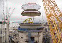 Giant crane lifts giant dome on to Hinkley C nuclear reactor building