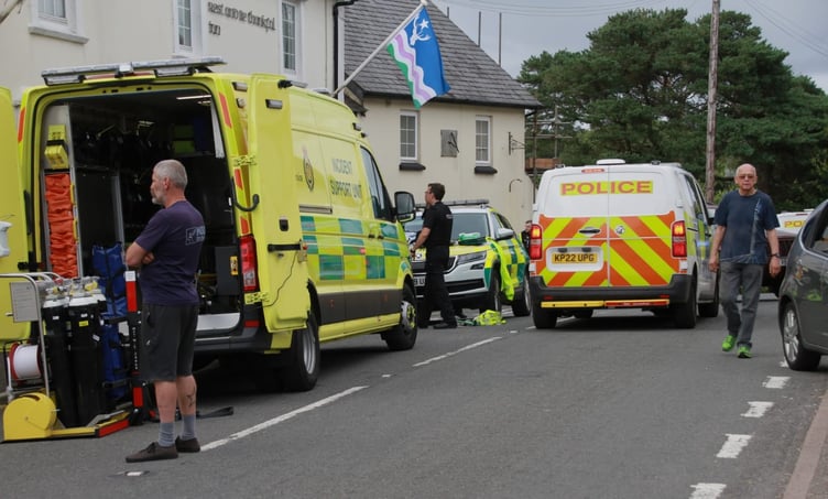 An ambulance outside the Rest and Be Thankful pub in Wheddon Cross, where a rest centre was set up for survivors of this afternoon's school coach crash. PHOTO: George Ody