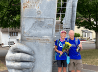 Husband and wife cancer survivors walk coast path