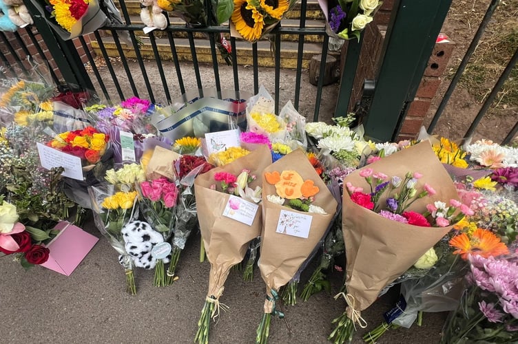 Floral tributes, stuffed toys and messages have been left outside the gates of Minehead Middle School in Somerset, following the tragic bus crash that killed a pupil on July 17 2025. Floral tributes have been left outside a school after a fatal bus crash that killed a pupil. One child died and 21 people were injured after the coach slid 20ft down an embankment during a day trip from Minehead Middle School in Somerset. Two other children were airlifted to hospital with serious injuries following the horrific crash on the A396 at around 3pm on Thursday. The 70-seater vehicle was taking pupils back from a zoo when it came off road Wheddon Cross.