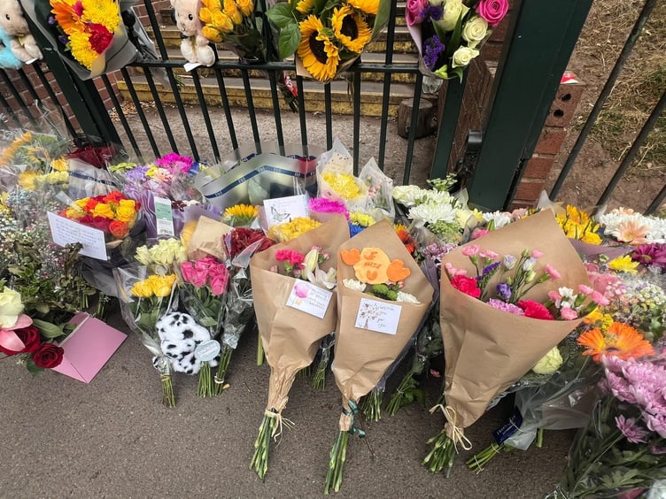 Floral tributes, stuffed toys and messages have been left outside the gates of Minehead Middle School in Somerset, following the tragic bus crash that killed a pupil on July 17 2025. Floral tributes have been left outside a school after a fatal bus crash that killed a pupil. One child died and 21 people were injured after the coach slid 20ft down an embankment during a day trip from Minehead Middle School in Somerset. Two other children were airlifted to hospital with serious injuries following the horrific crash on the A396 at around 3pm on Thursday. The 70-seater vehicle was taking pupils back from a zoo when it came off road Wheddon Cross.