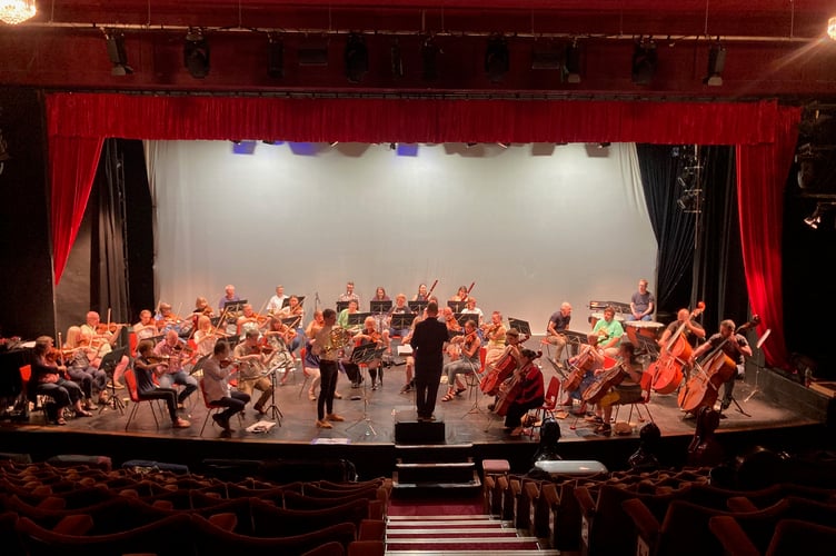 Conductor Christopher Stark takes the orchestra for this year's Minehead and Exmoor Music Festival through rehearsals in the Regal Theatre. PHOTO: Elizabeth Atkinson.