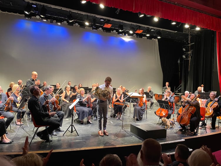 French horn soloist Jonathan Farey takes a bow after the opening part of the Mienhead and Exmoor Music Festival concert in the Regal Theatre. PHOTO: Kate Spiers.