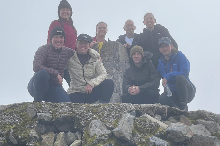 Porlock's Aimee James and her team completing the Three Peaks Challenge to support the Dorset and Somerset Air Ambulance on a foggy day.