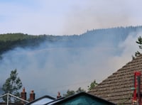 Firefighters battling grass fire on multiple fronts