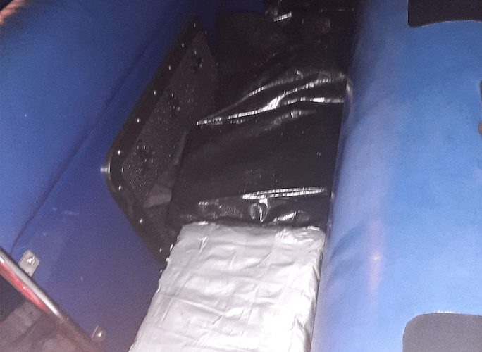 Packages suspected of containing cocaine found by National Crime Agency officers on a boat off the West Somerset coast. PHOTO: NCA.