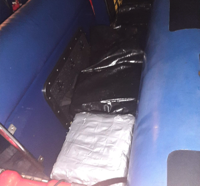 Packages suspected of containing cocaine found by National Crime Agency officers on a boat off the West Somerset coast. PHOTO: NCA.